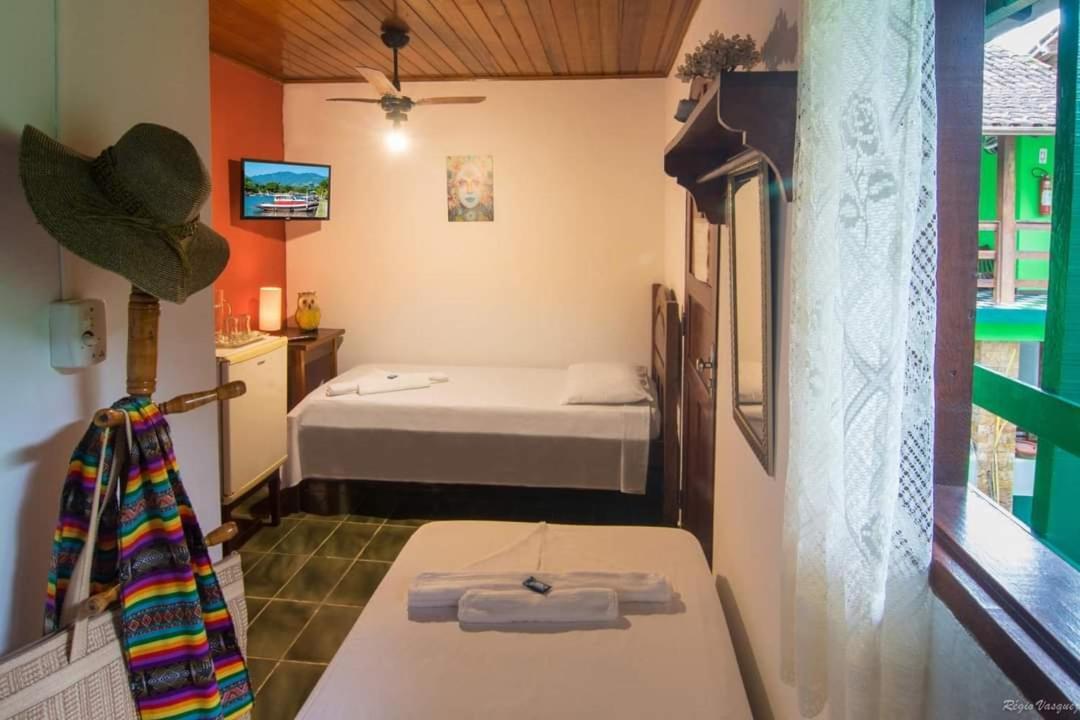 Quarto Deluxe com 2 Camas de Solteiro