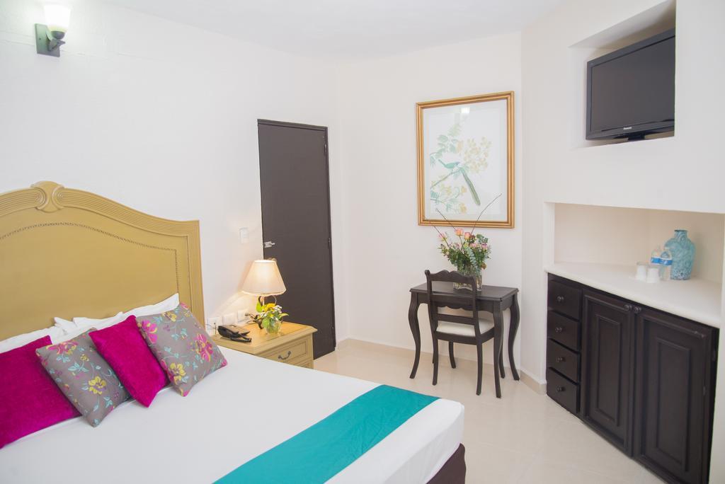 Habitación con cama extragrande.