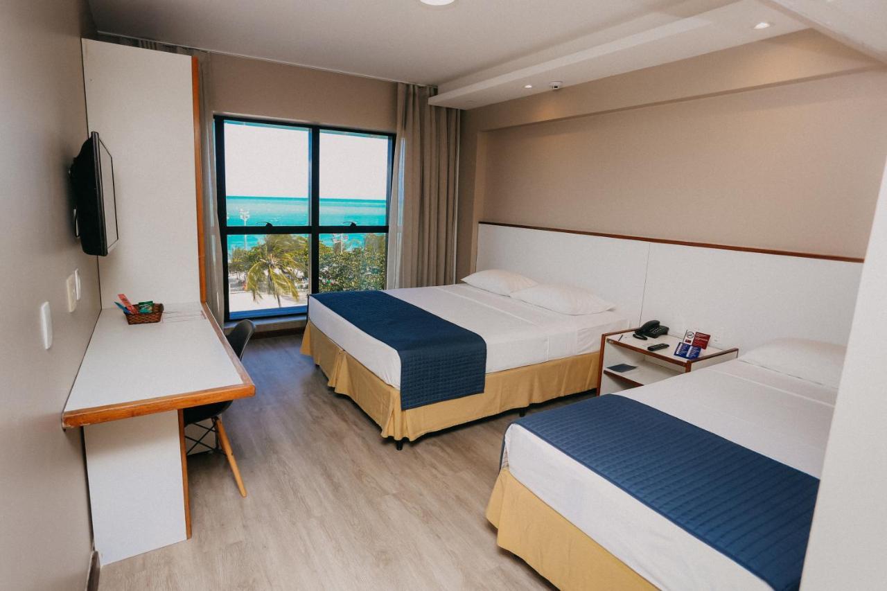 Quarto Triplo Deluxe com Vista do Mar