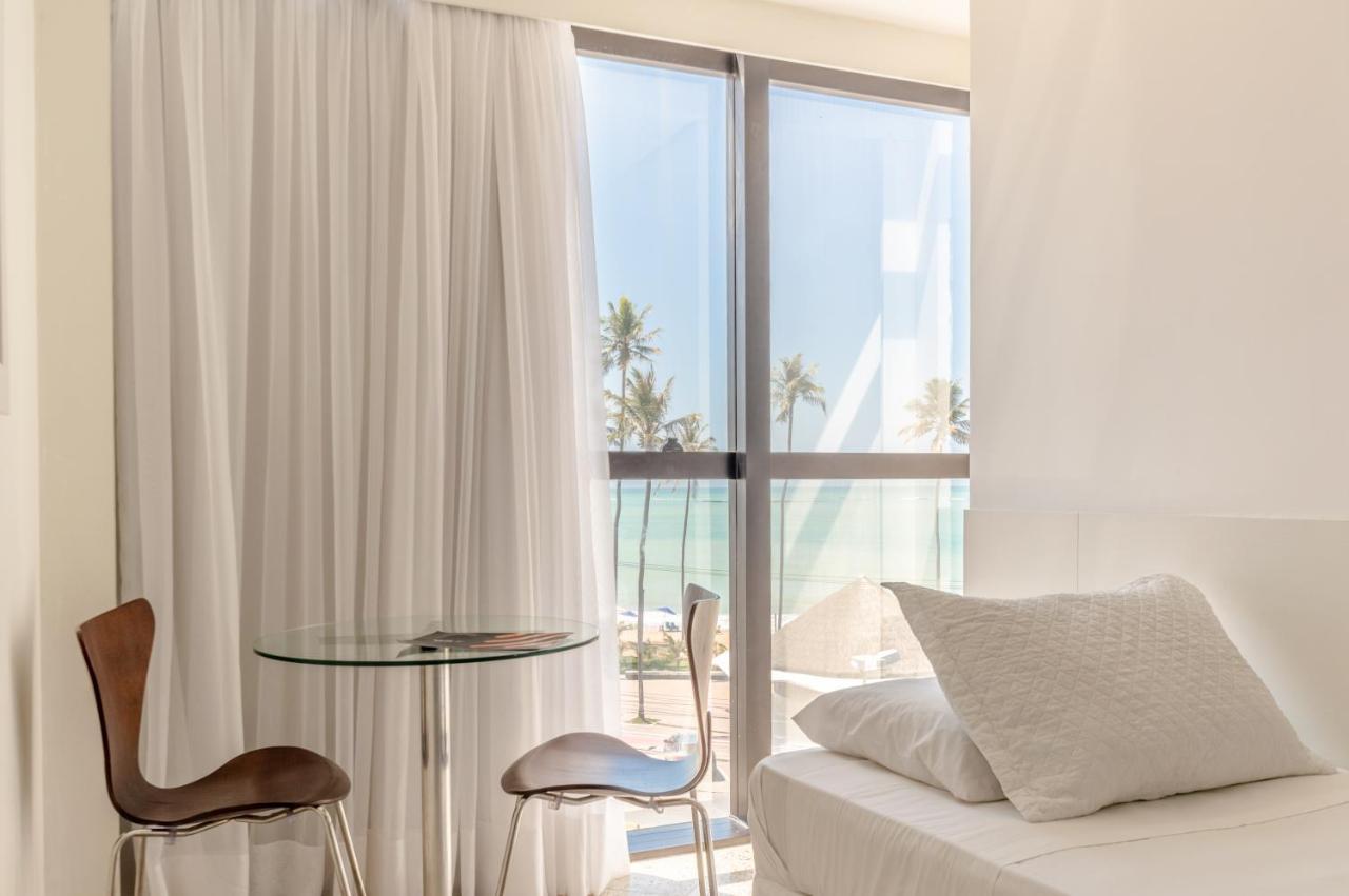 Quarto Triplo Premium com Vista Lateral do Mar