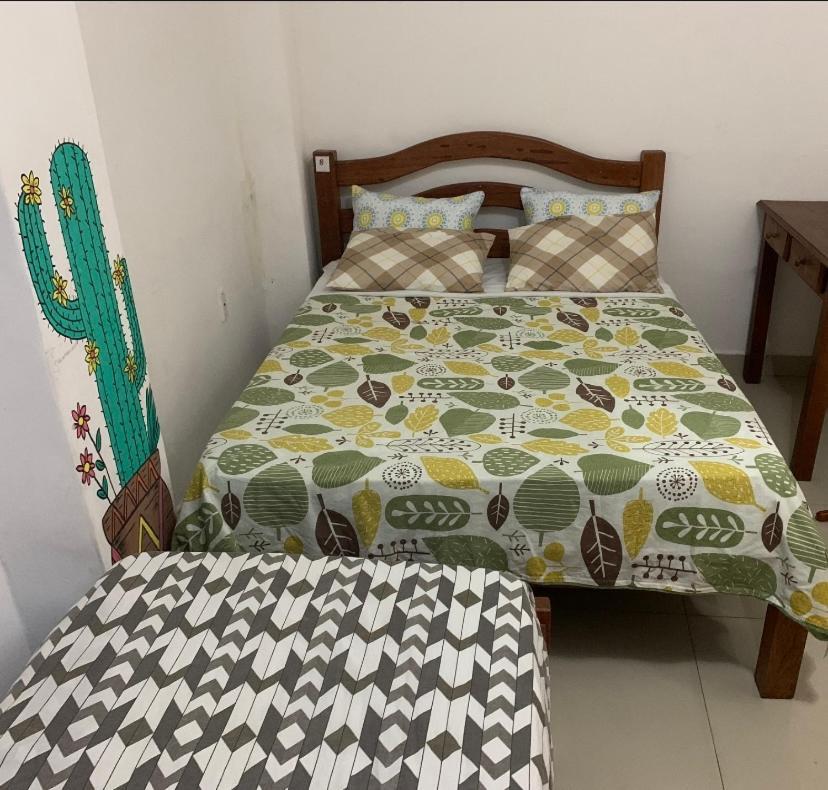 Quarto Triplo Básico com Banheiro Compartilhado
