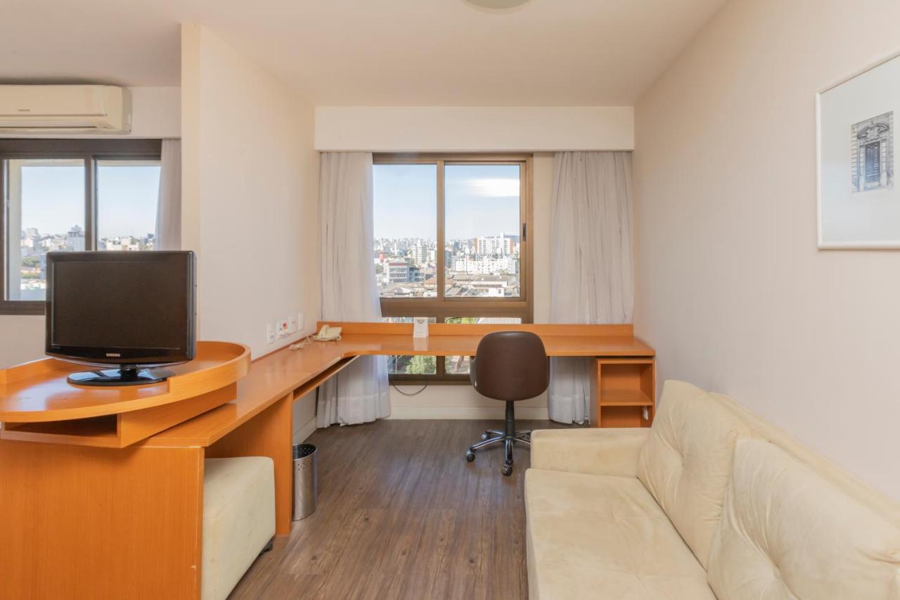 Quarto standard com 2 camas de solteiro e sofá-cama