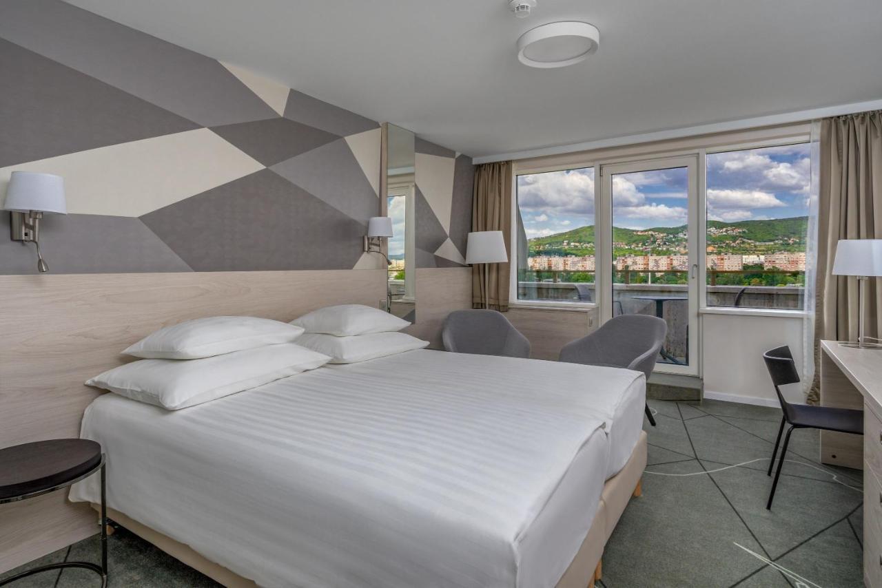 Habitación Premium Plus con acceso al centro de fitness y bienestar