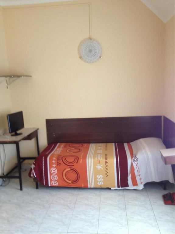 Camera Singola con Bagno in Comune