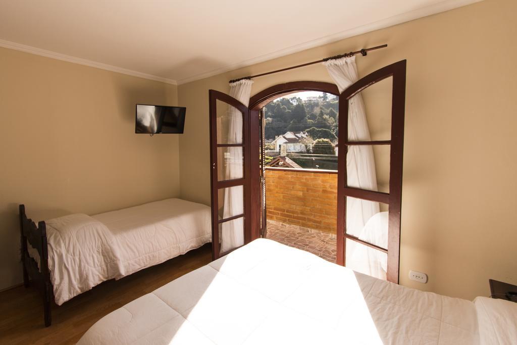 Quarto Duplo com Varanda