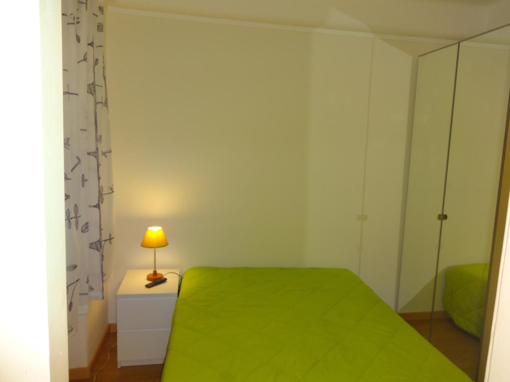 Quarto Triplo com Banheiro Compartilhado