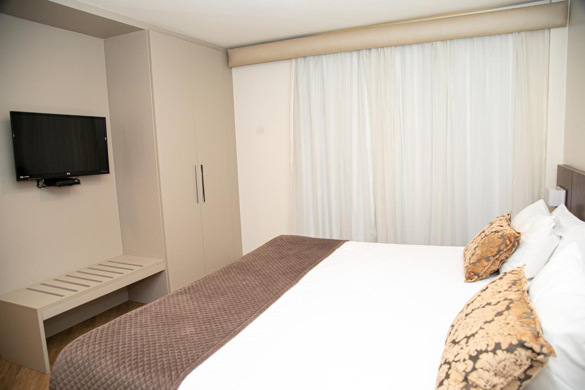 Quarto Duplo com Banheira de Hidromassagem