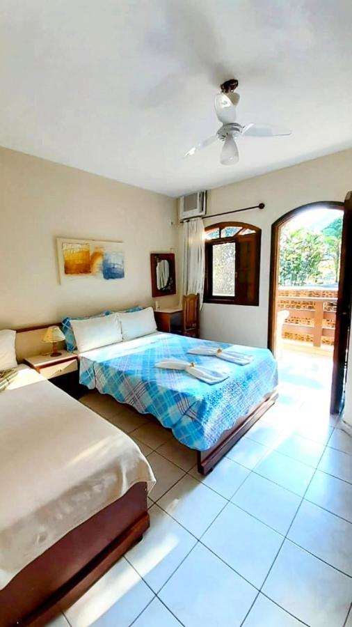 Quarto Triplo com Varanda