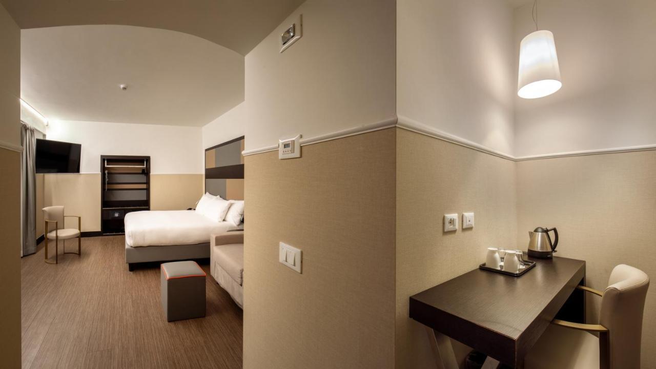 Quarto King Superior com Sofá-Cama
