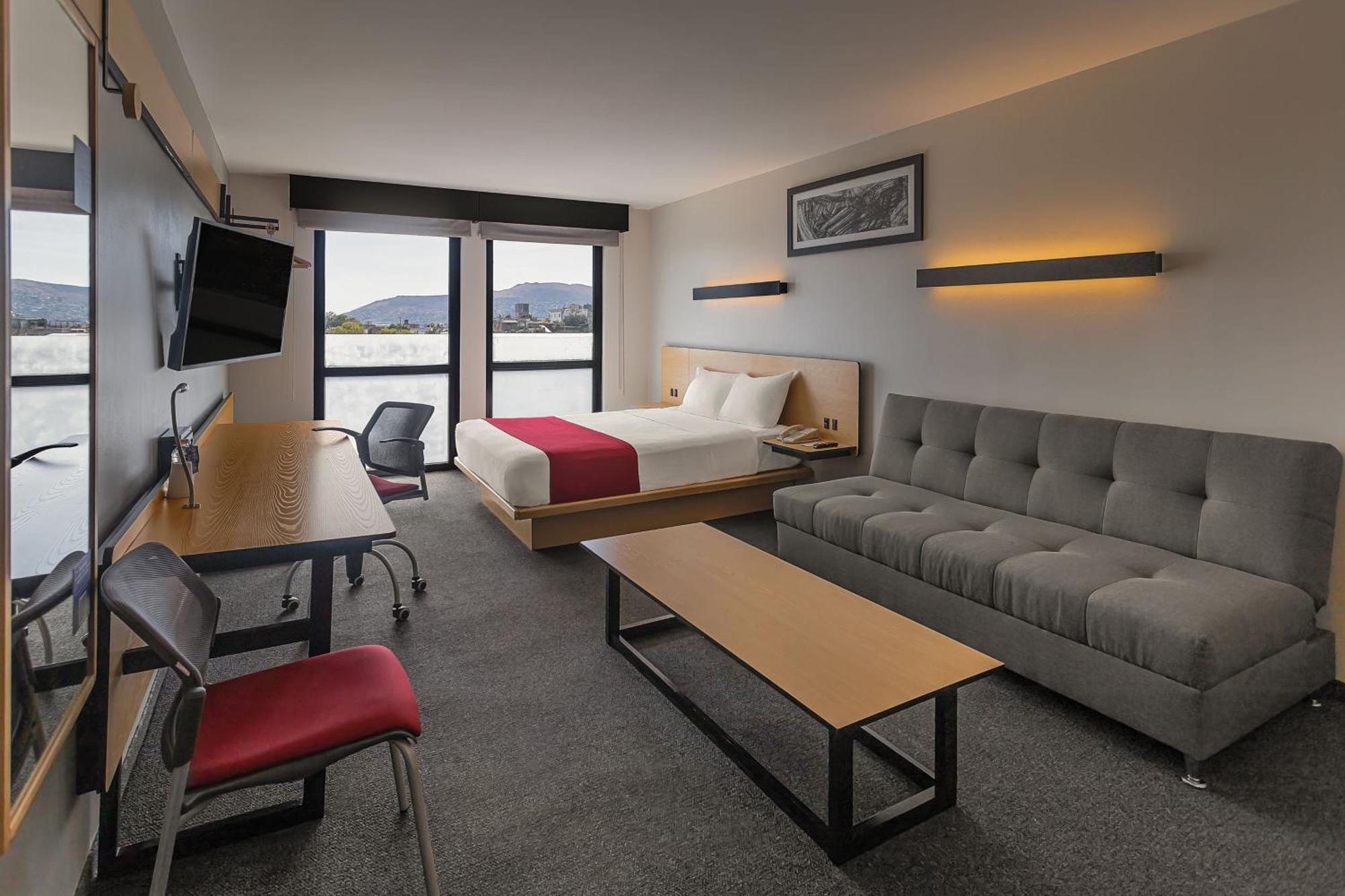 Habitación Doble Superior con sofá cama