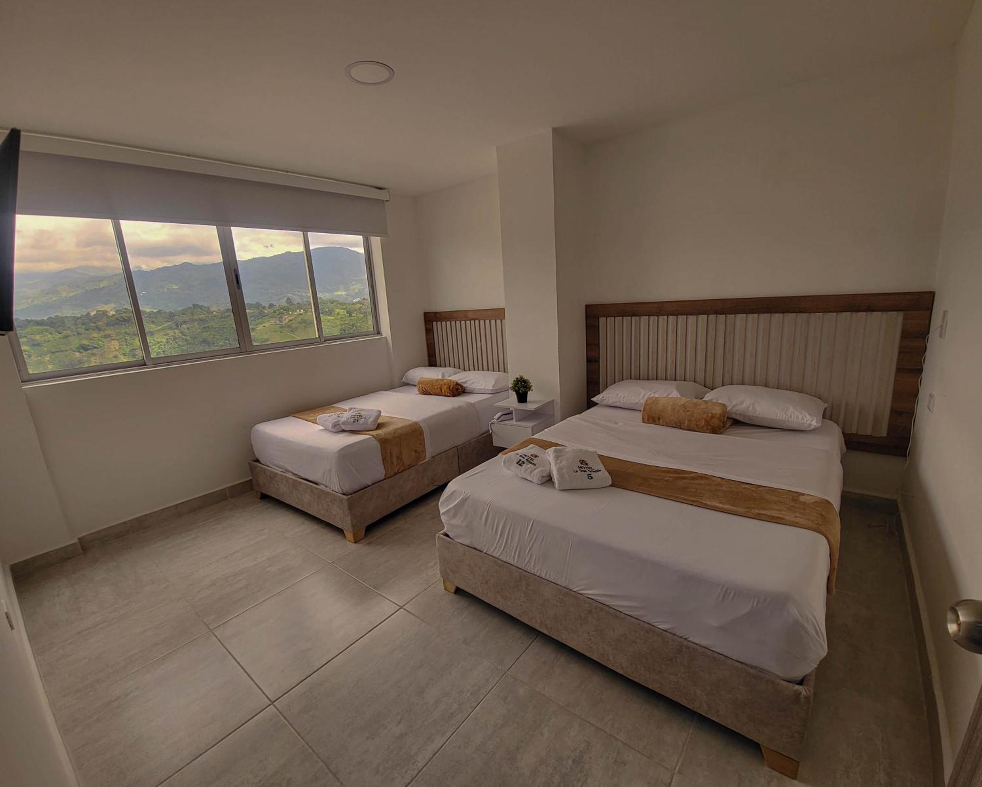 Habitación Doble Deluxe - 2 camas dobles