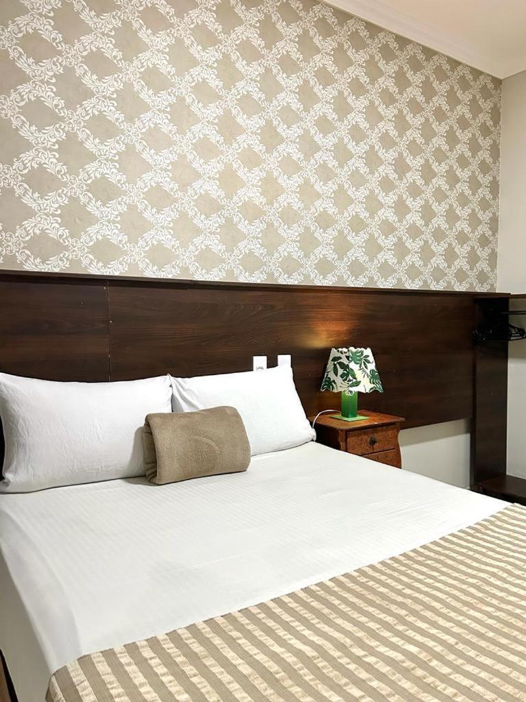 Quarto Duplo com Banheiro Compartilhado