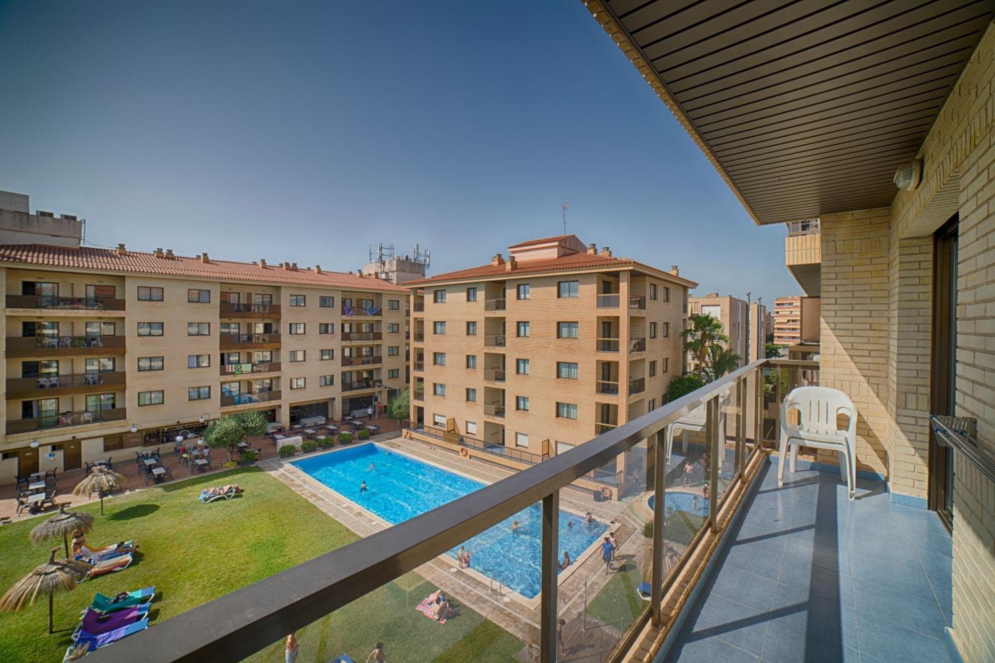 One-Bedroom Apartment pool view,887451958:JPEG