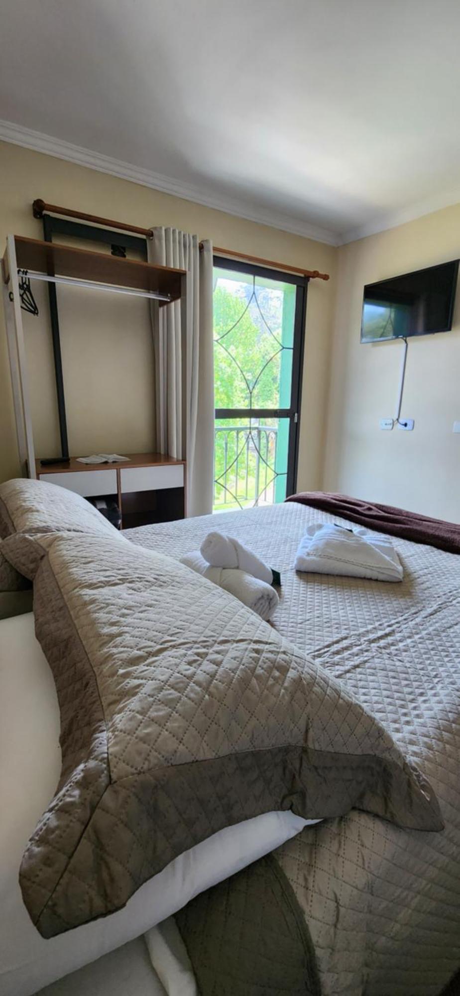Quarto Triplo com Varanda