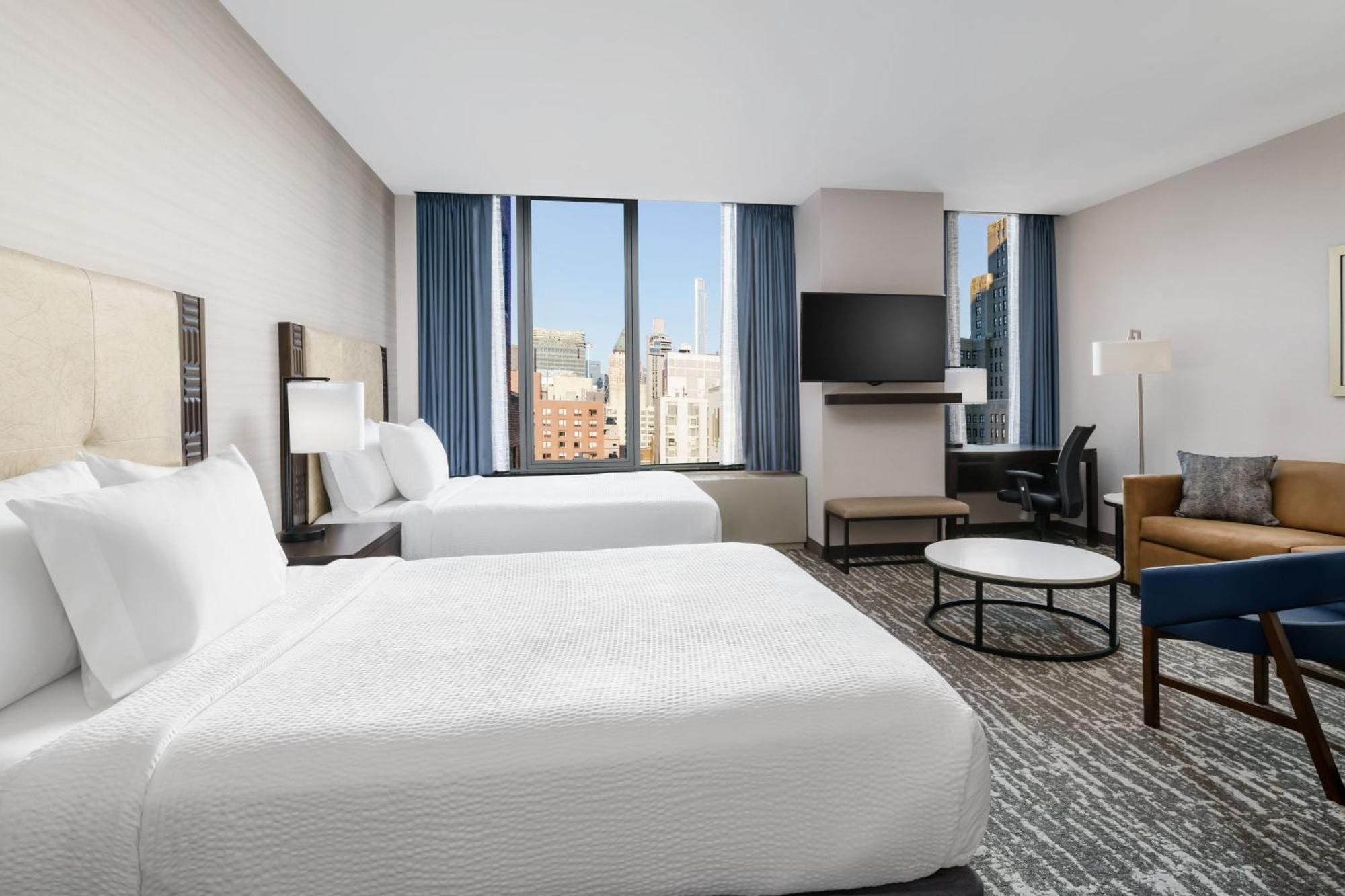 One-Bedroom Queen Suite Two Queen Beds Bathtub Sofa Bed Mobility Access or Hearing Accessible