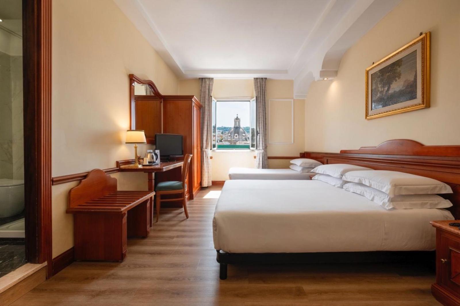 Quarto Quádruplo com Vista da Cidade