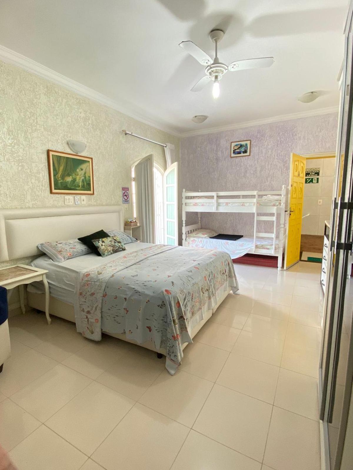Quarto Quádruplo Premium