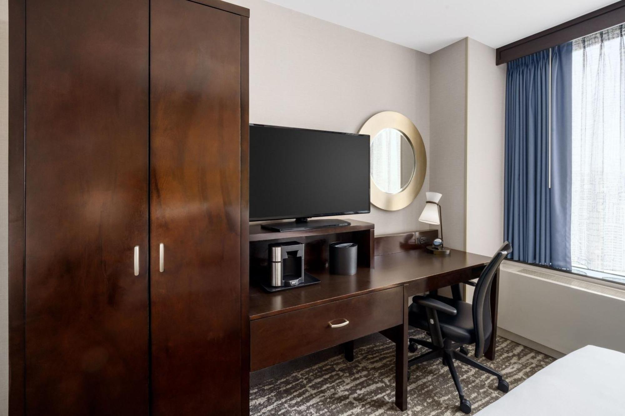 Room Two King Beds City View Roll Shower Transfer Shower Mobility Access or Hearing Accessible