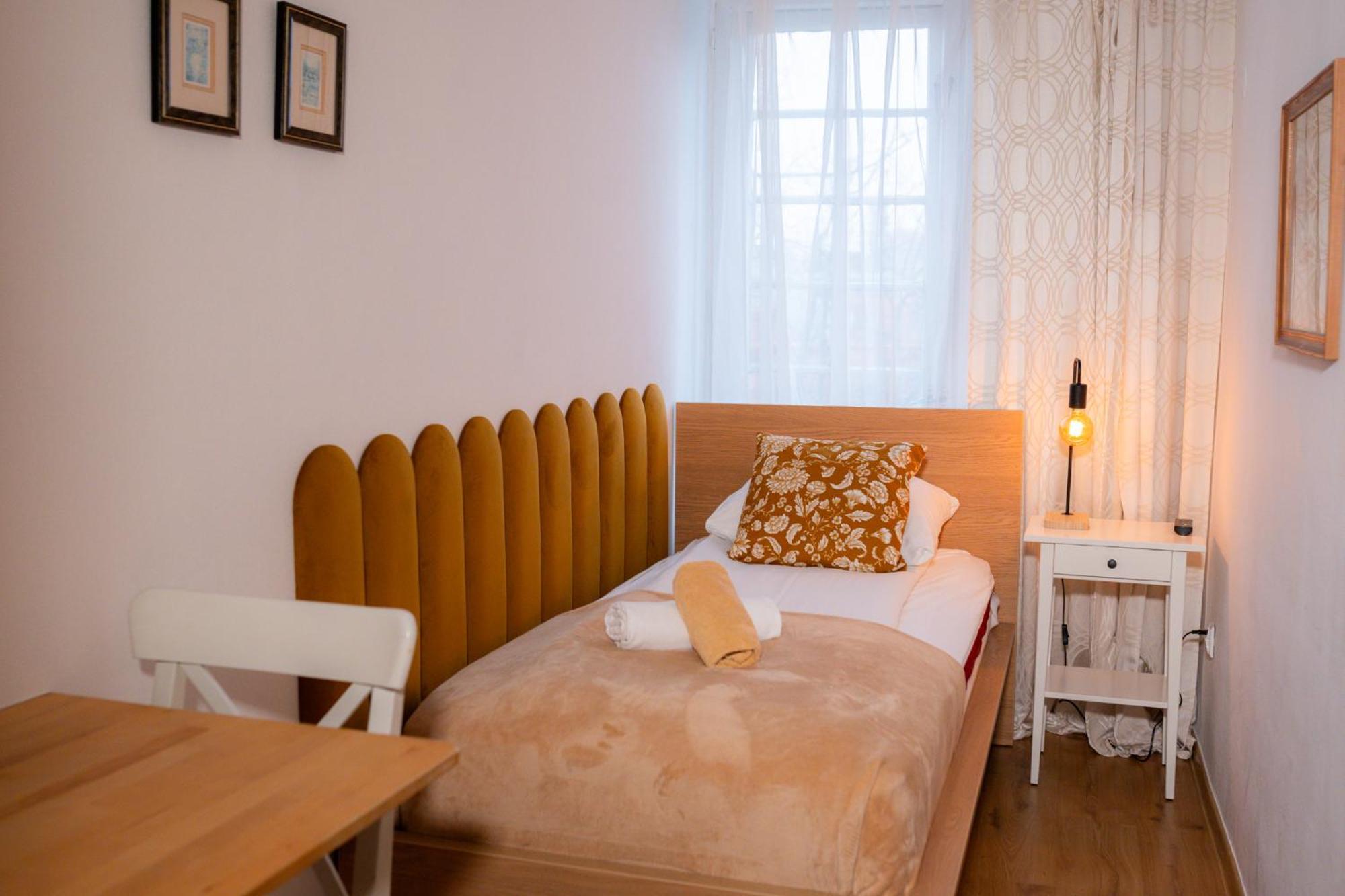 Camera Singola con Bagno in Comune