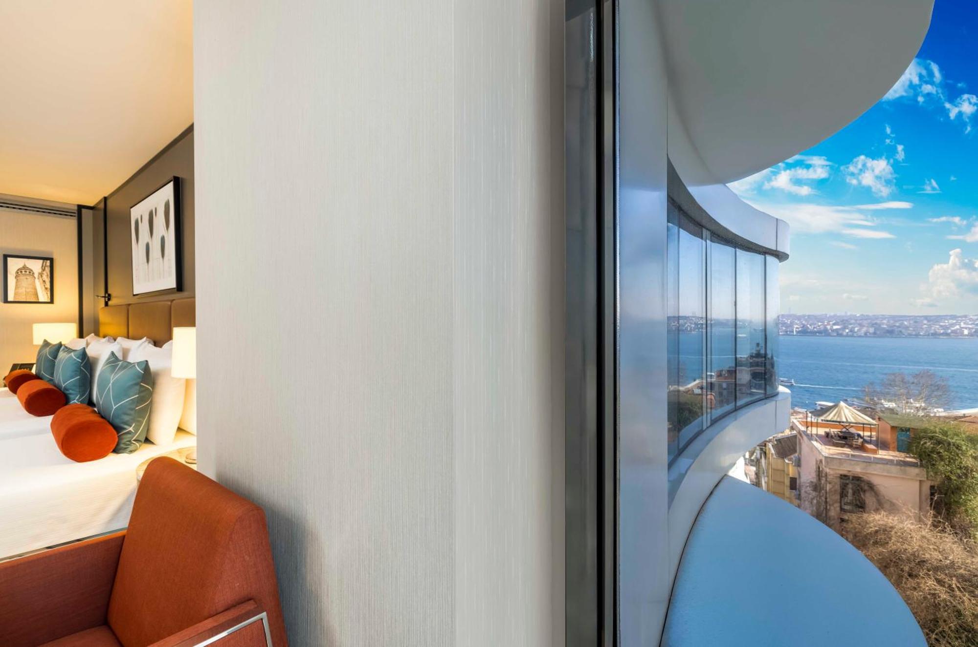 Camera Tripla Deluxe con Vista Mare Parziale