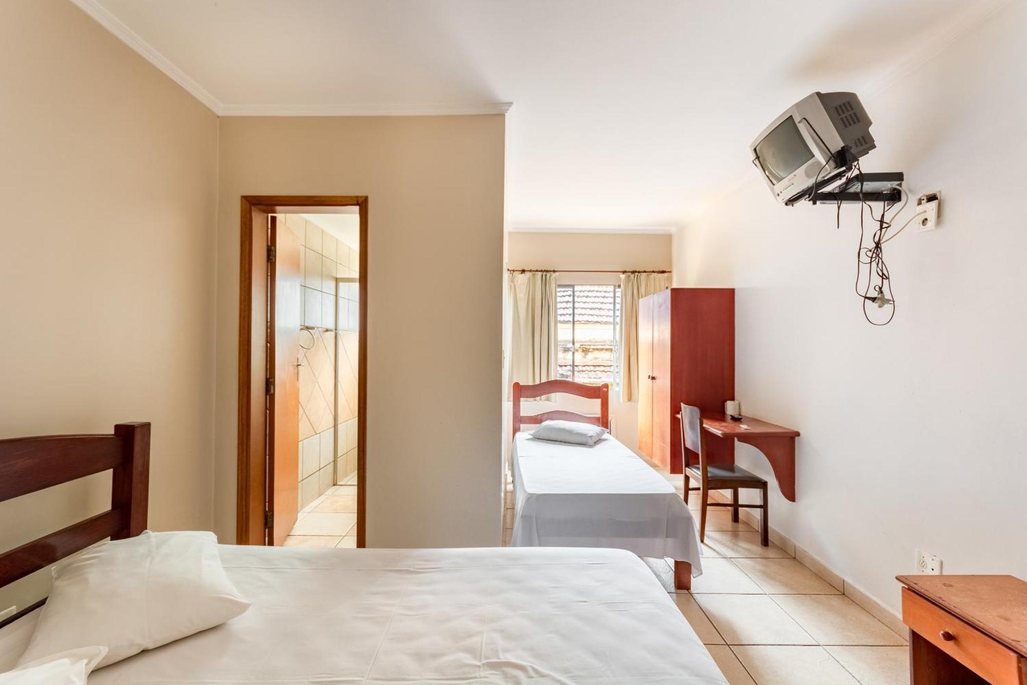 Triple Room (1 Double bed + 1 Single bed)
