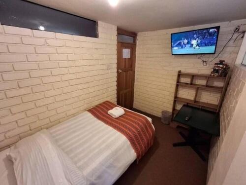 Quarto Individual