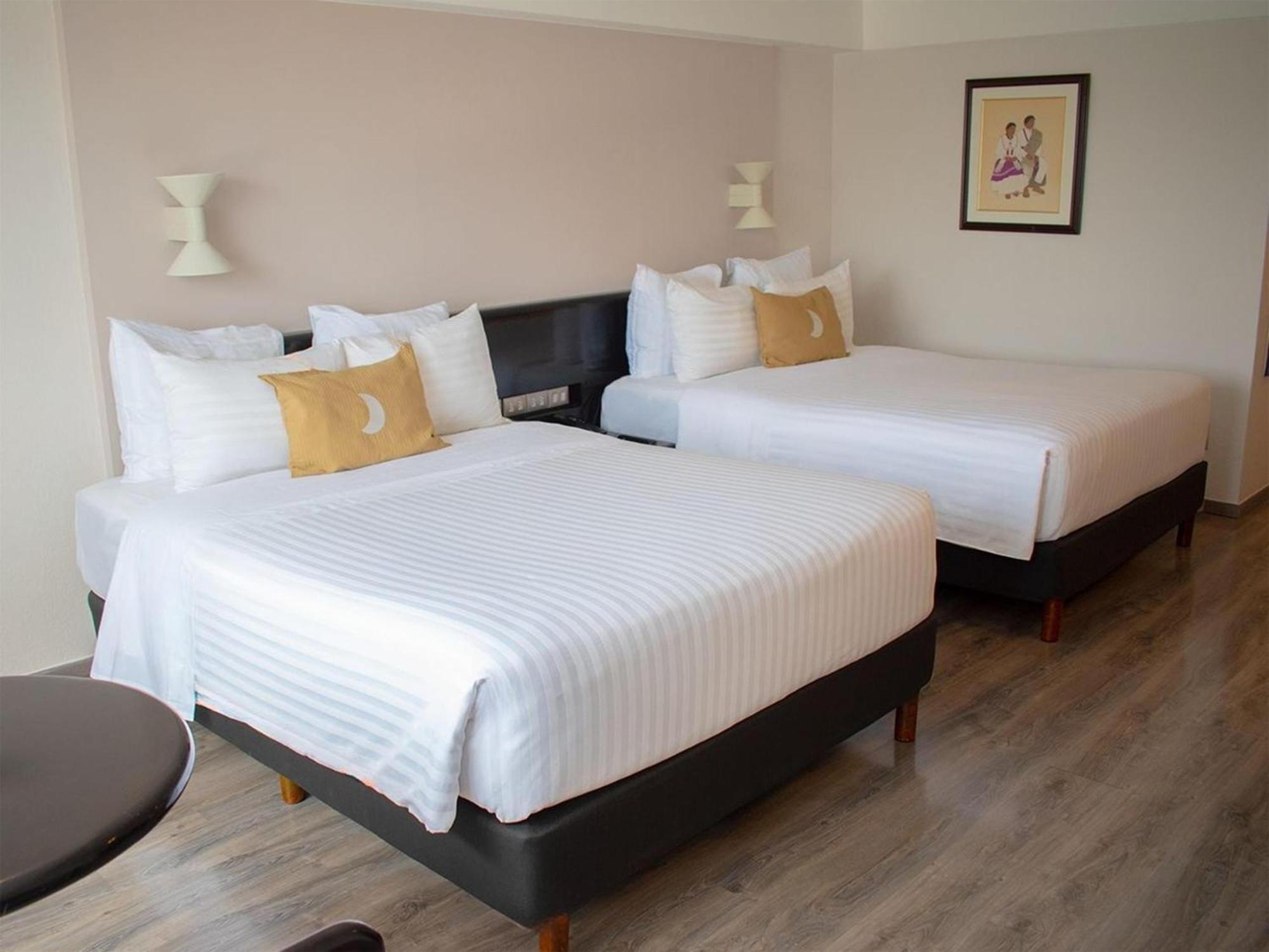 Habitación Doble Estándar con 2 camas dobles - No fumadores