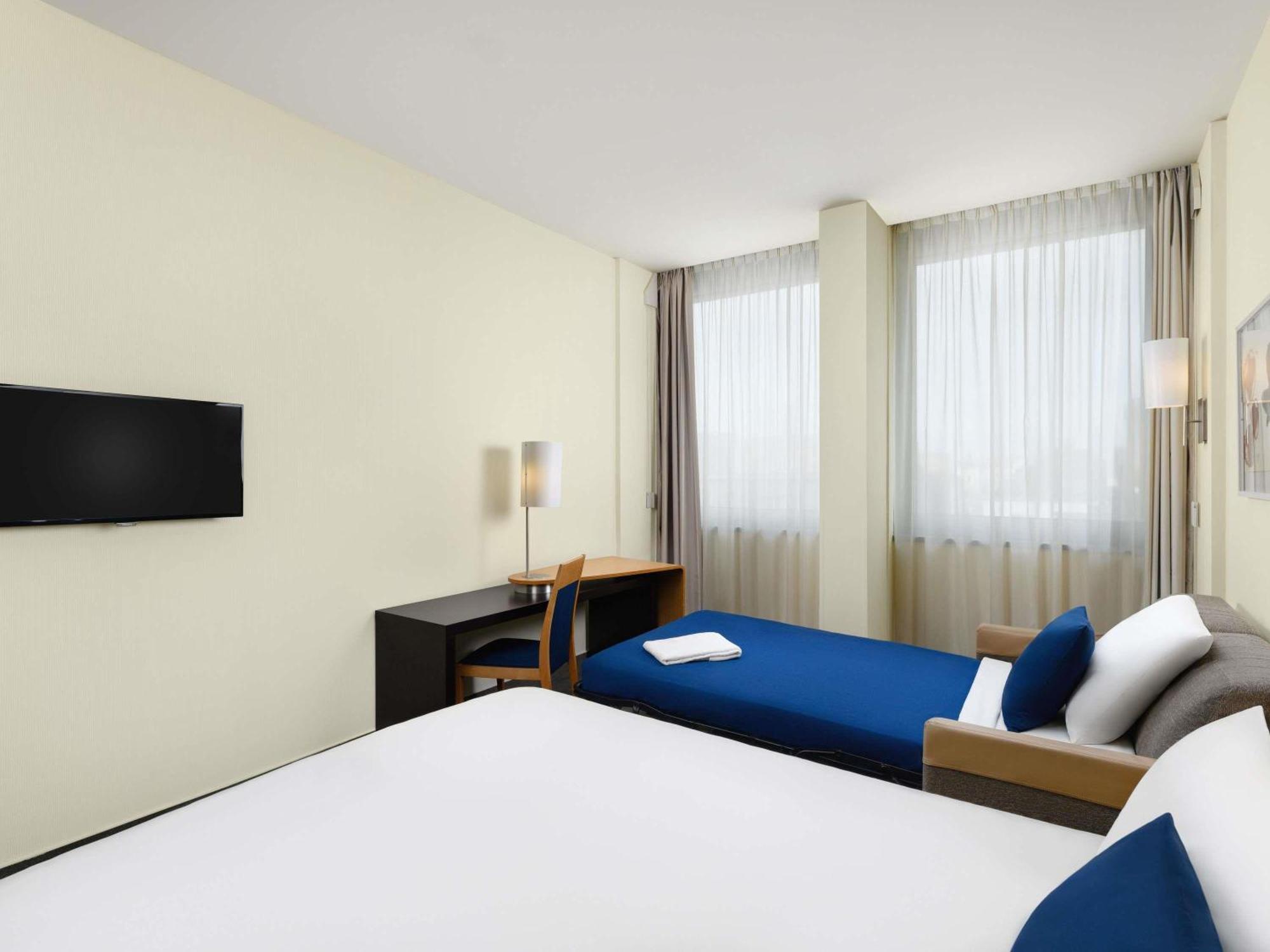 Habitación Doble Familiar Superior con sofá cama