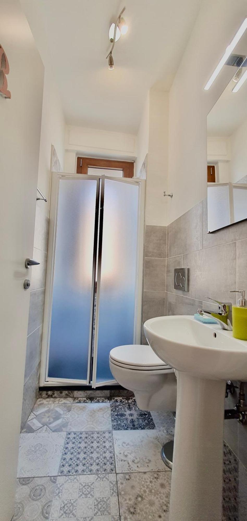 Single Room Shared Shower Toilet