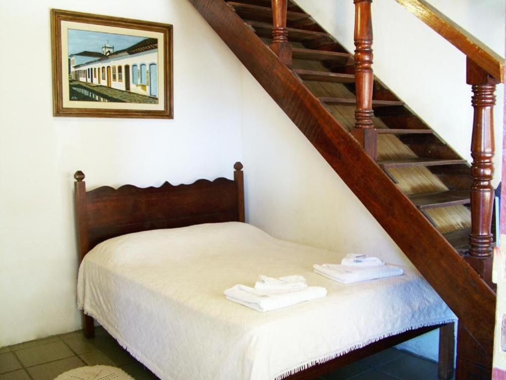 Quarto Quádruplo com Varanda