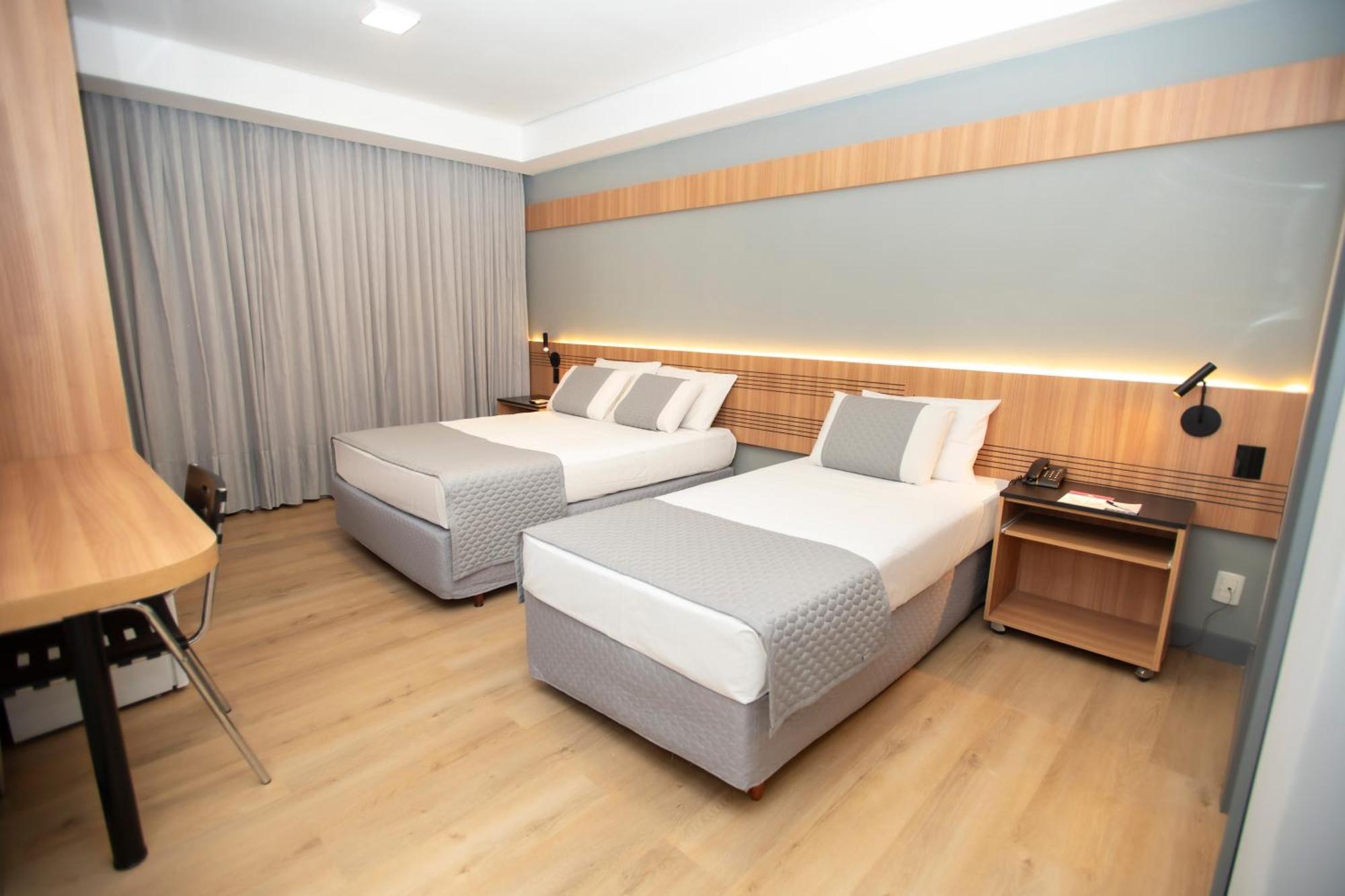 Quarto Triplo Executivo
