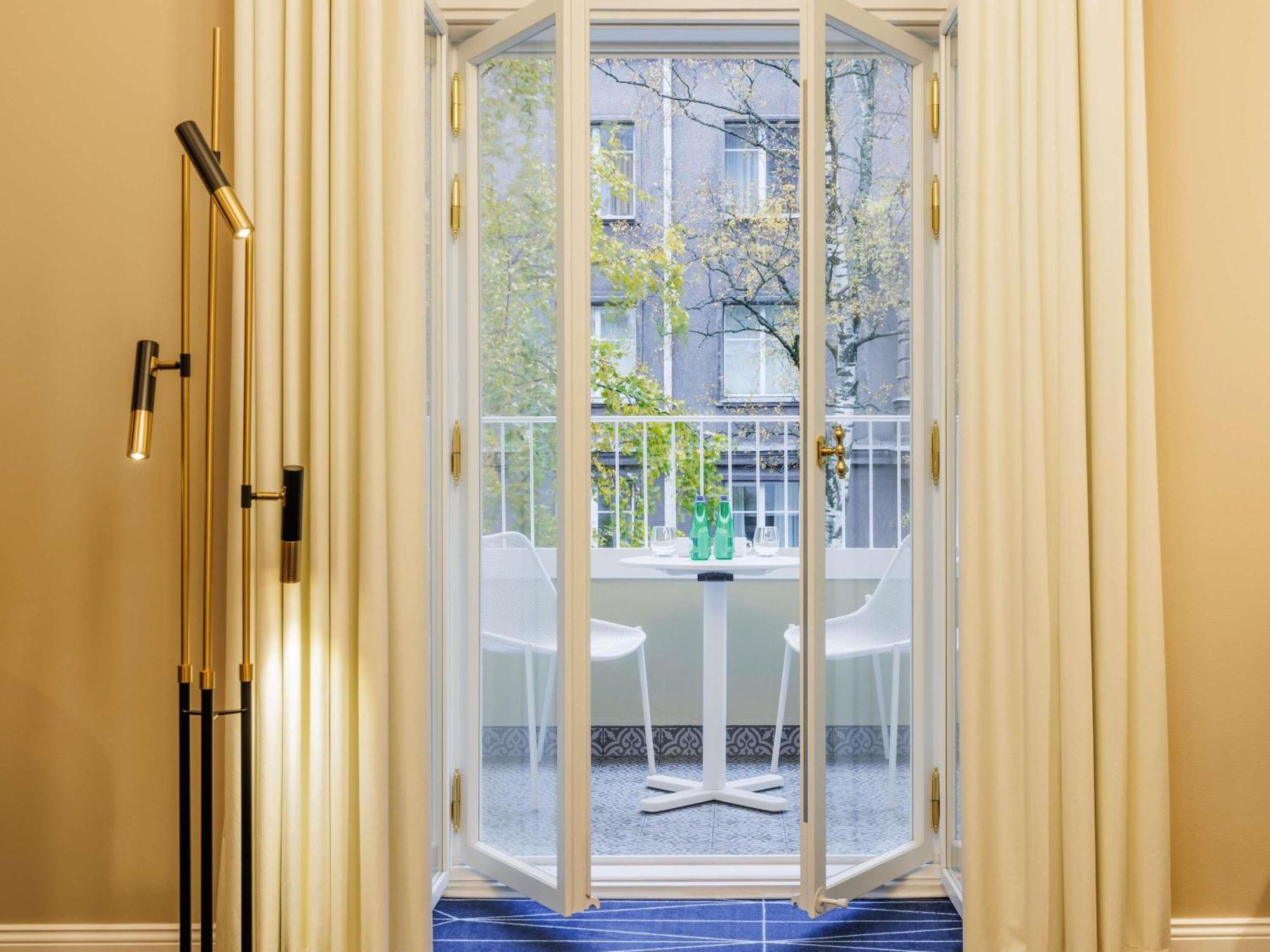 Suite Deluxe con Letto Matrimoniale e Balcone