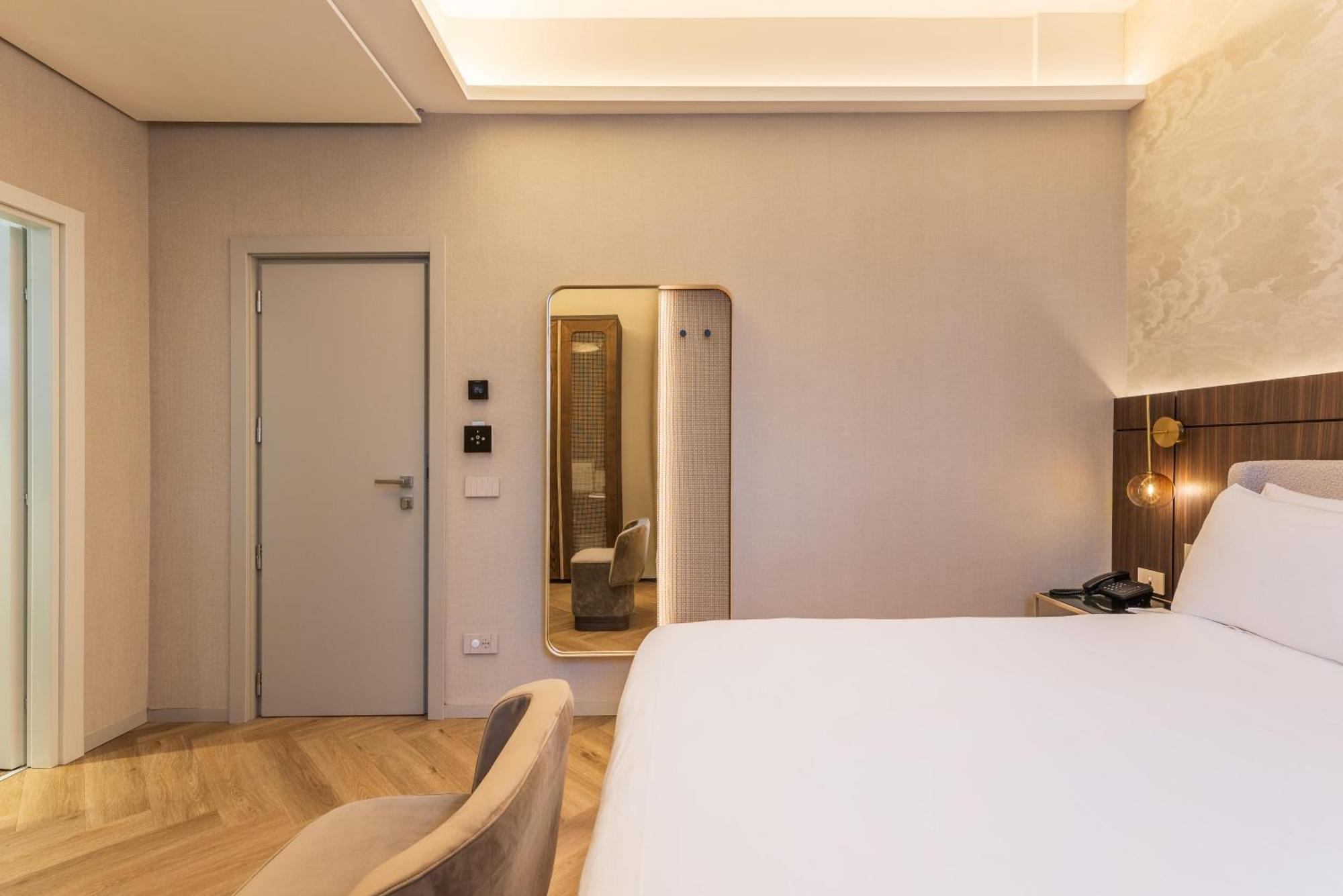 Economy room double bed internal window to corridor
