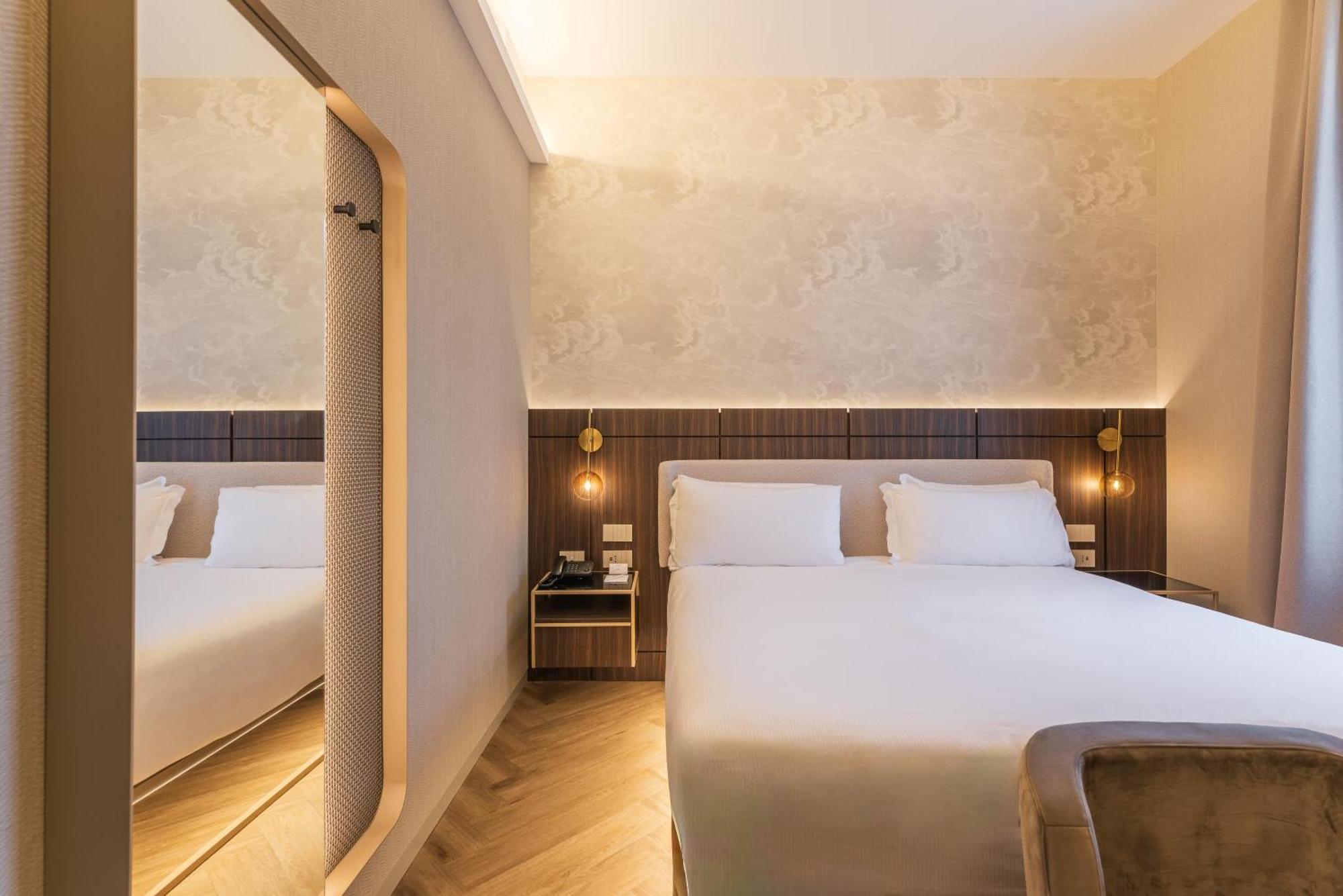 Economy room double bed internal window to corridor