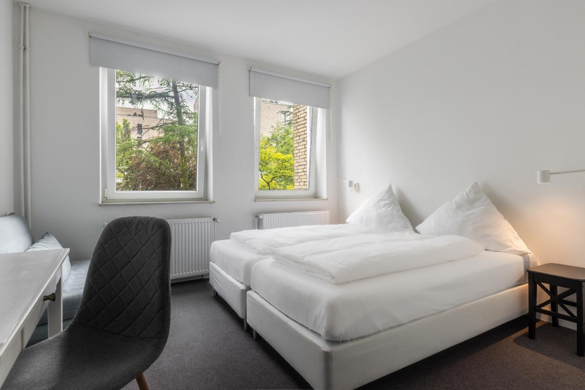 Doppel- oder Zweibettzimmer mit Bad - 22