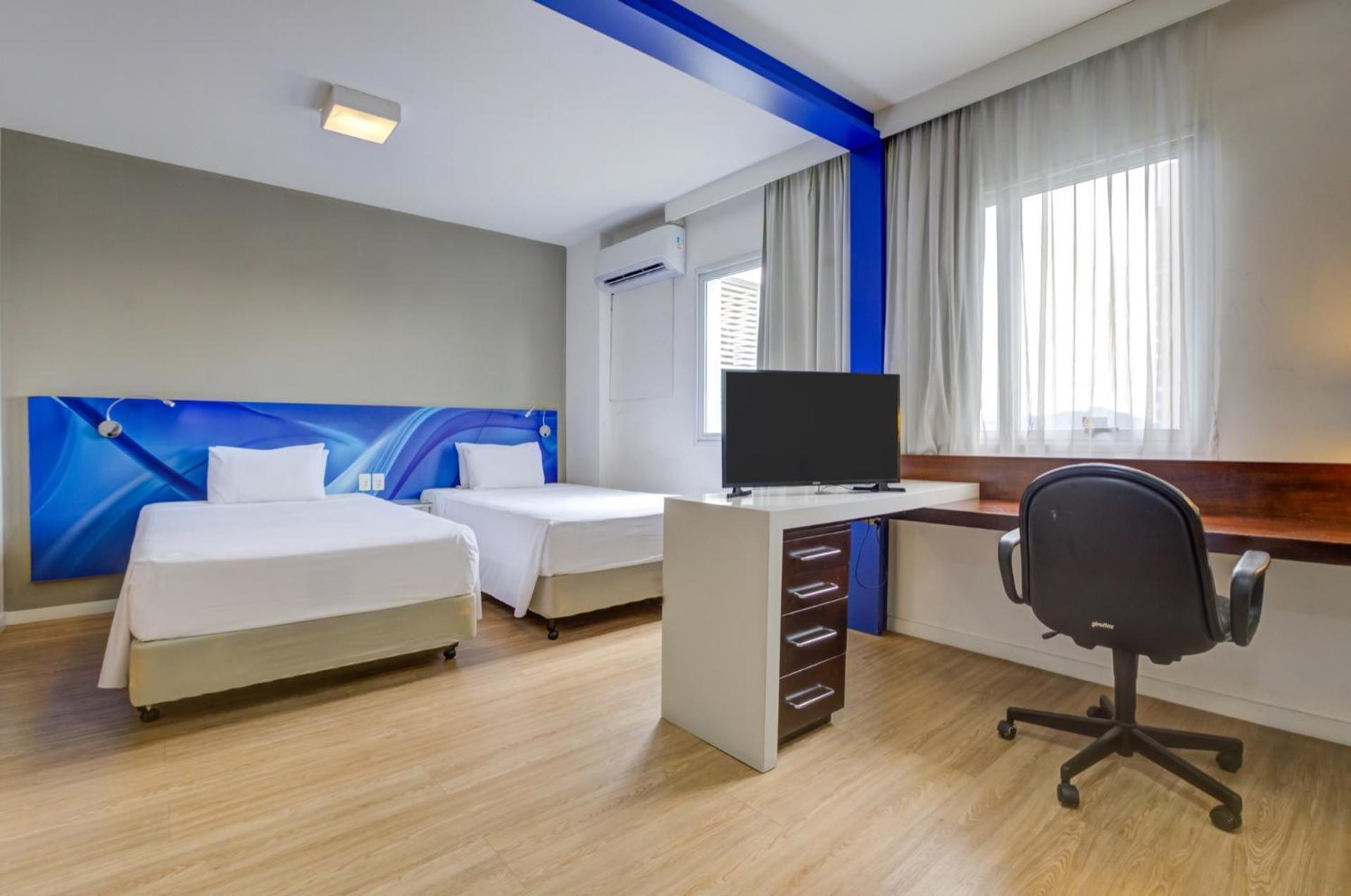 Quarto Executivo com 2 Camas de Solteiro