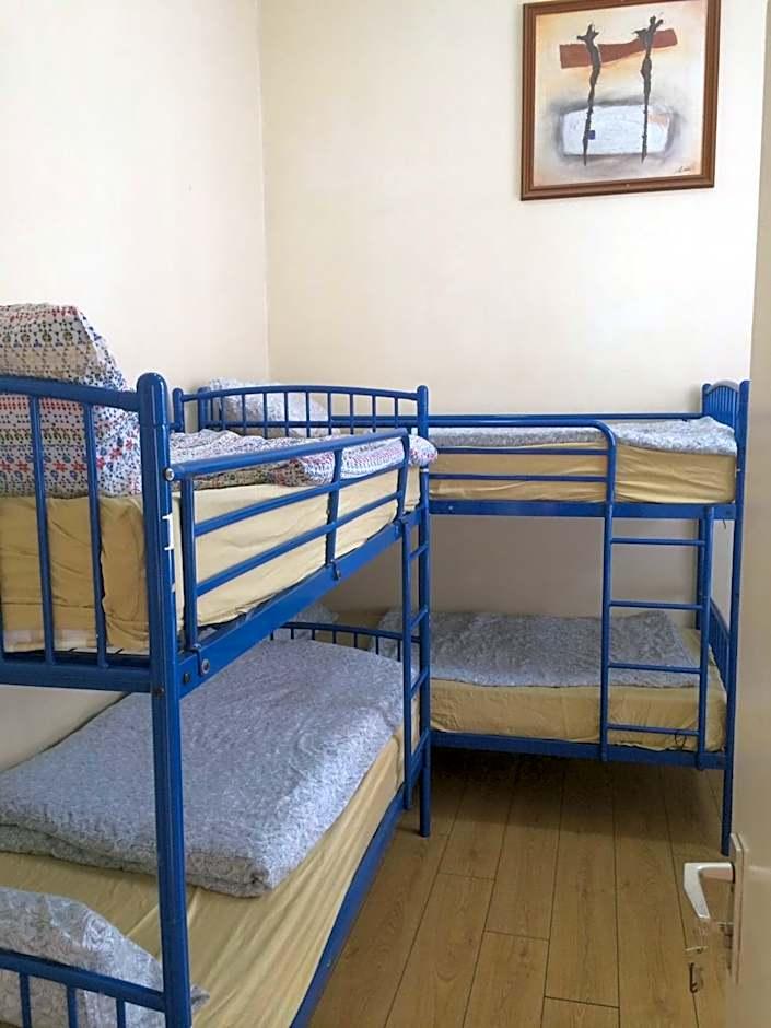 Cama individual en dormitorio mixto compartido (6 camas)