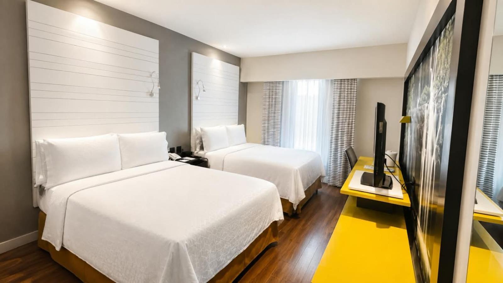 Habitación Doble con 2 camas dobles - No fumadores
