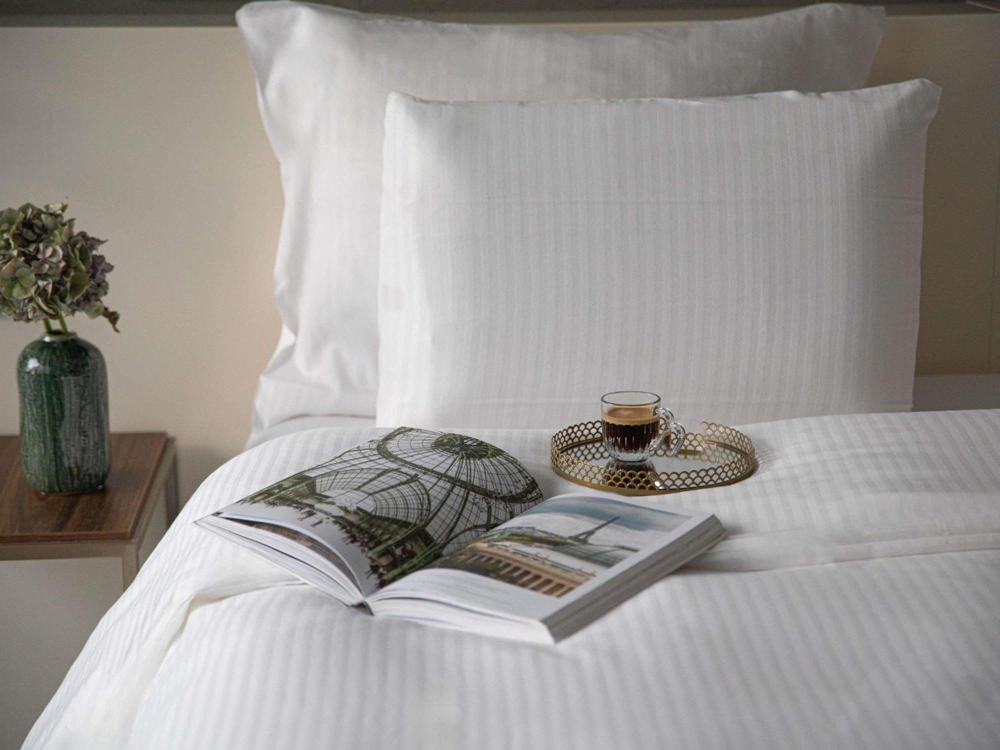 Suíte Júnior King com Sofá-cama e Vista Torre Eiffel