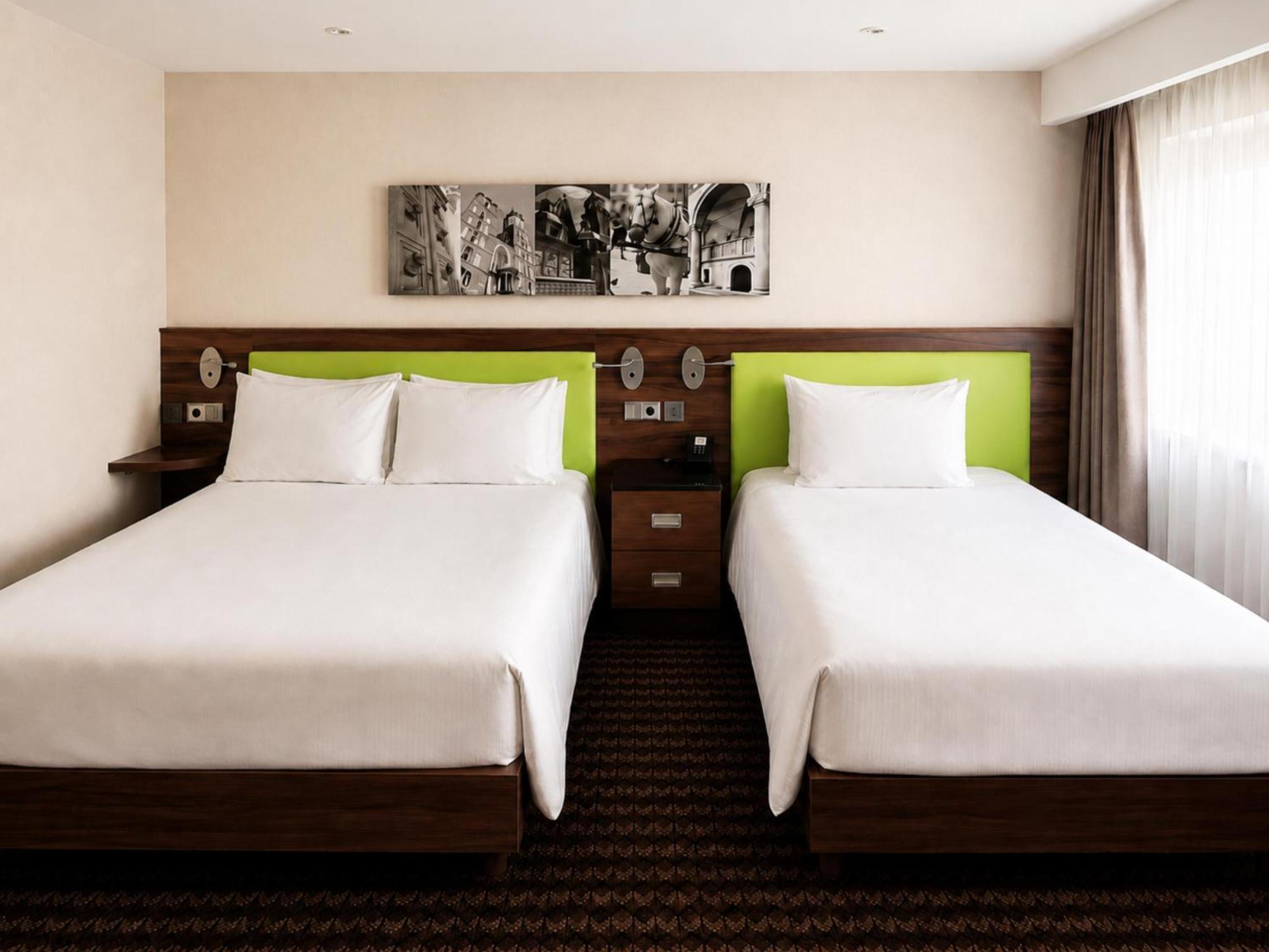 Room with One Queen Bed and One Single Bed