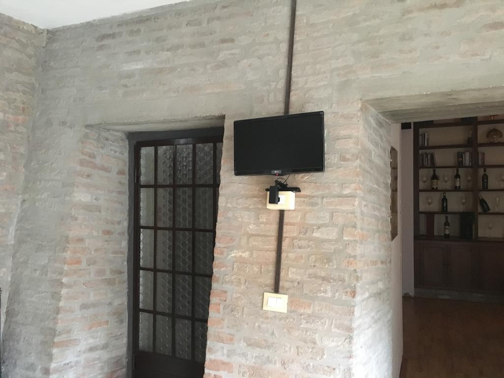 Camera Familiare con Vista Giardino