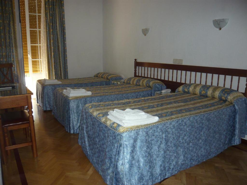 Camera Doppia con Letti Singoli con Letto Supplementare