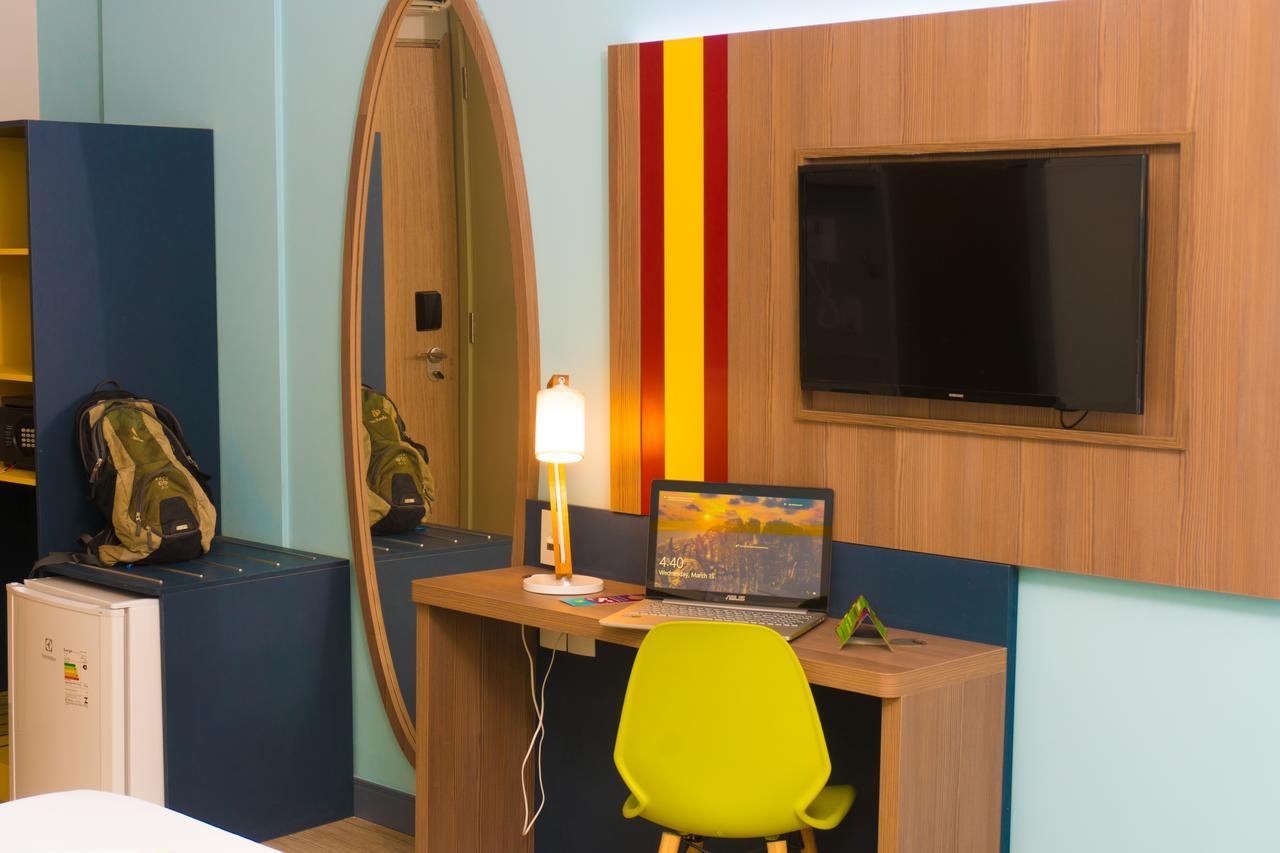 Quarto Triplo Standard (2 Adultos + 1 Criança)