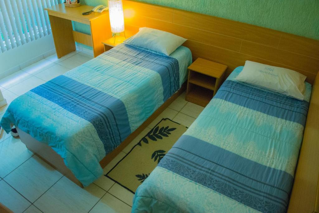 Quarto com 2 Camas de Solteiro