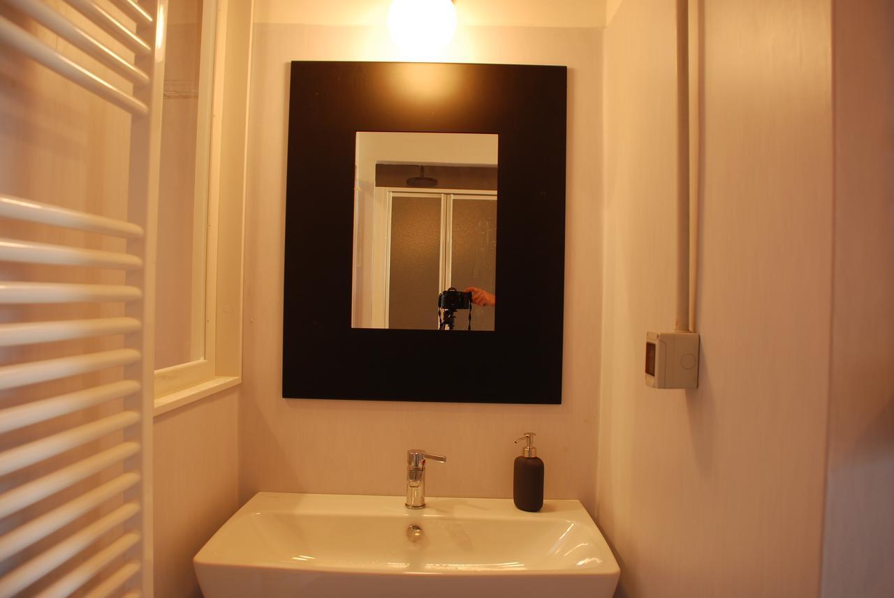 Camera Doppia con Letti Singoli e Bagno in Comune