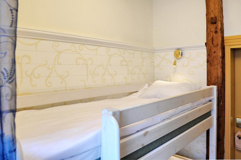Camera Piccola con Letto a Castello e Parcheggio Gratuito
