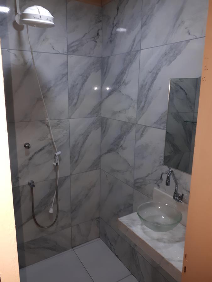 Cama de Solteiro em Dormitório Feminino com Ar-condicionado