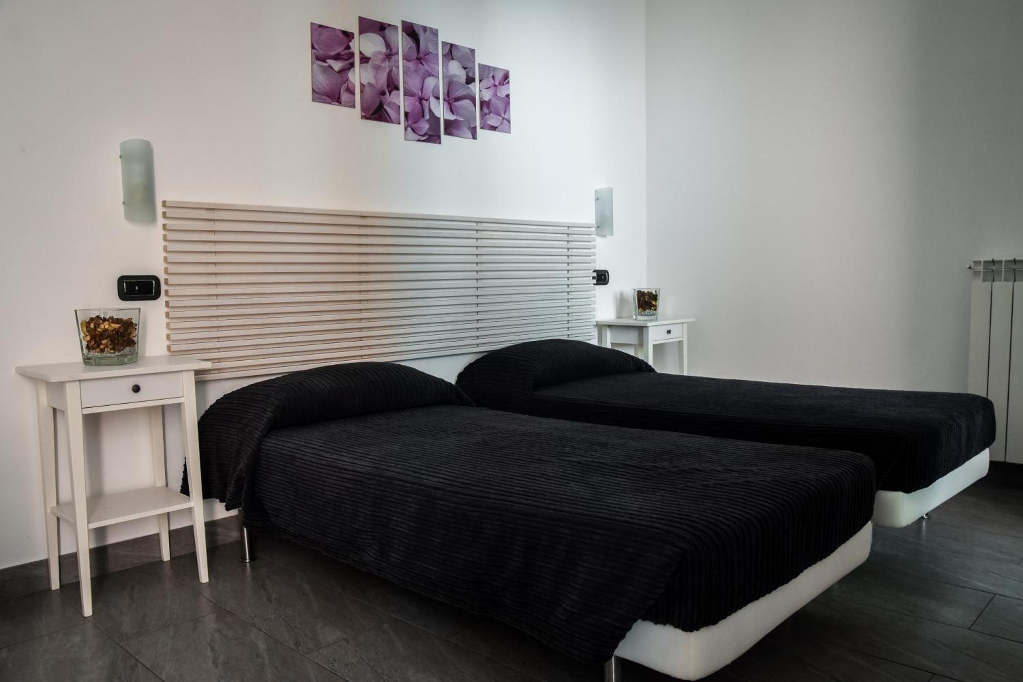 Camera Matrimoniale/Doppia con Letti Singoli con Bagno Privato