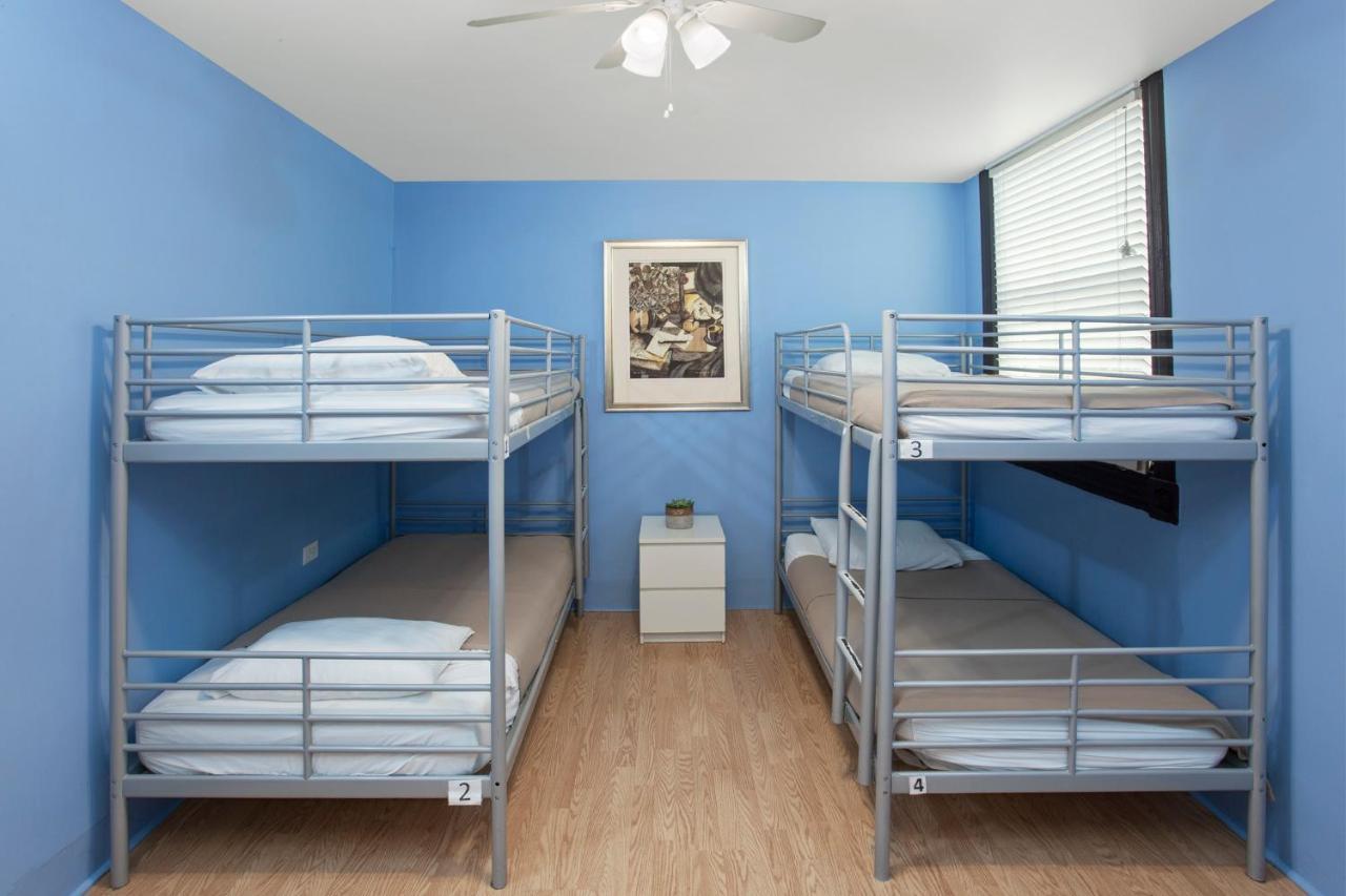 Cama en habitación femenina compartida de 4 camas