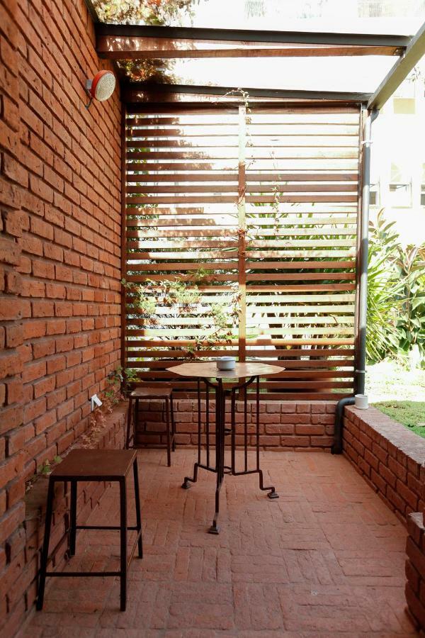 Suite Junior con patio y vistas al jardín